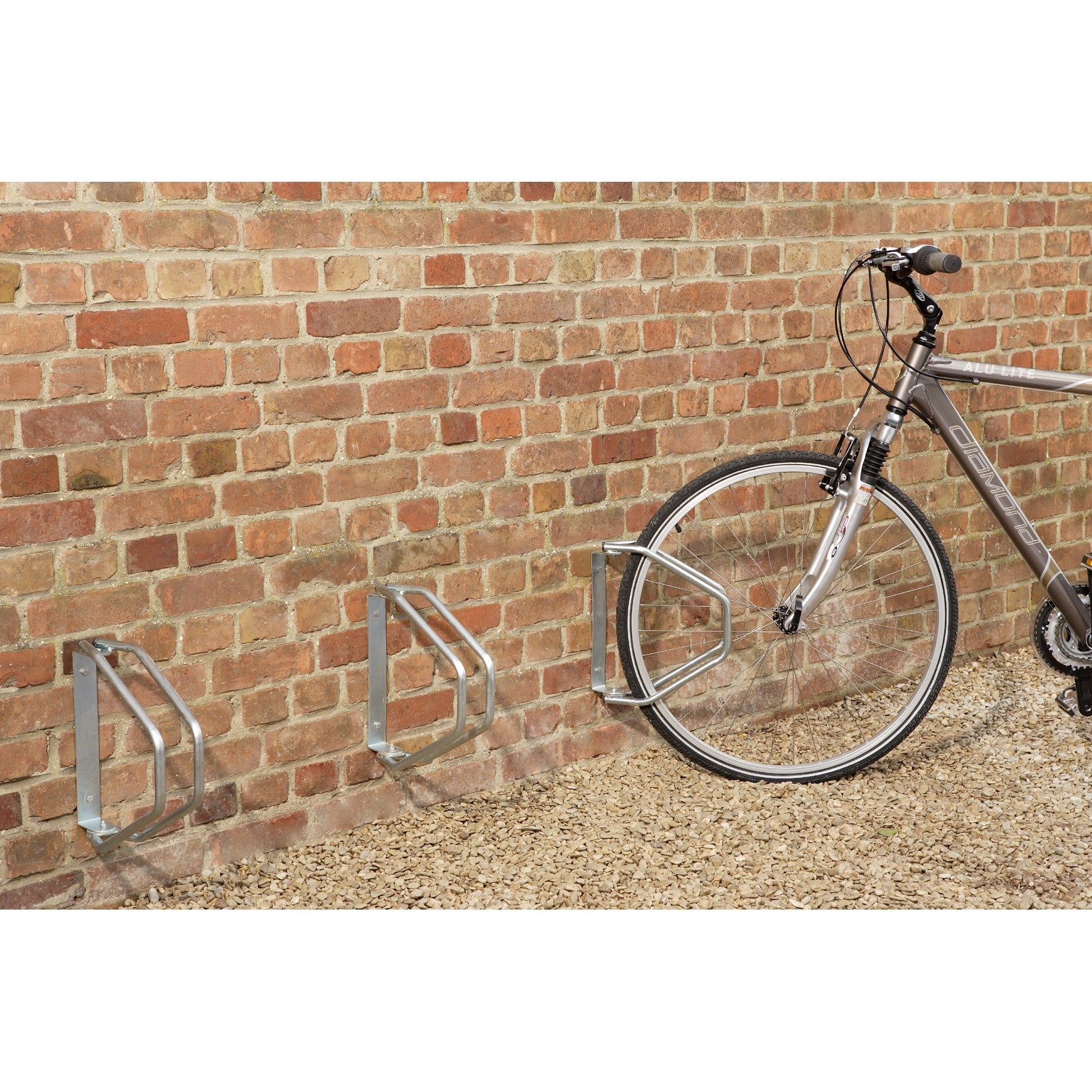 Adjustable wall garage for bicycles