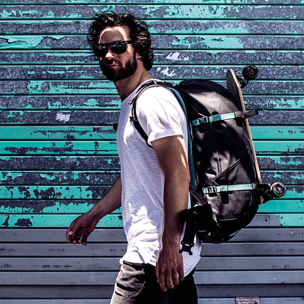 Système de Fixation d'Accessoires pour Sac à Dos Atrack